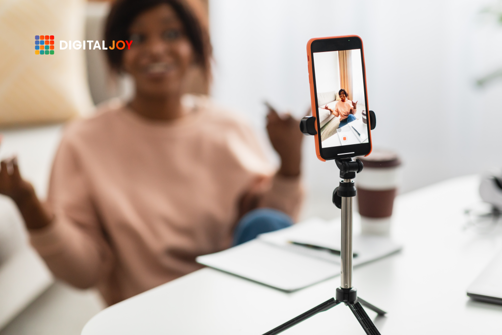 woman making a video on her phone